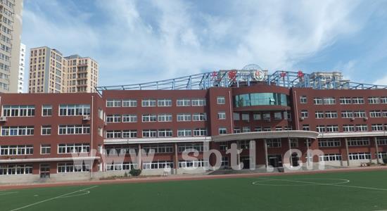 沈陽光明中學外墻仿磚涂料施工案例